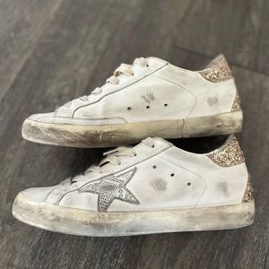 Golden Goose gold sneakers
